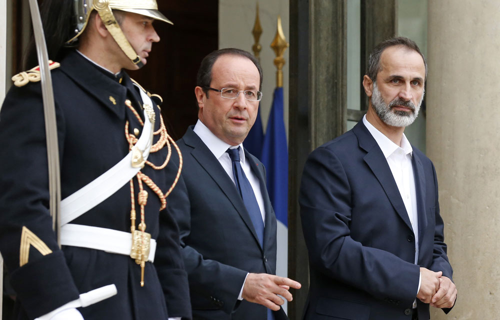 François Hollande recevant un dirigeant islamiste syrien à l'Elysée. D. R.